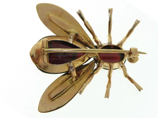 Spilla a forma di mosca in oro giallo con ambre rosse